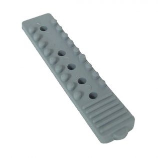 Pièce de caoutchouc inférieur pour attache-queue